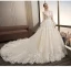 Stunning Champagne Wedding Dresses 2018 Ball Gown Lace Appliques Pearl Scoop Neck Backless Long Sleeve Royal Train Wedding