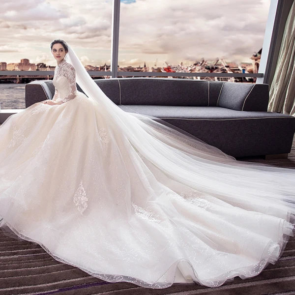 Chic / Beautiful Champagne Wedding Dresses 2018 Ball Gown Lace Appliques High Neck Backless Long Sleeve Cathedral Train Wedding