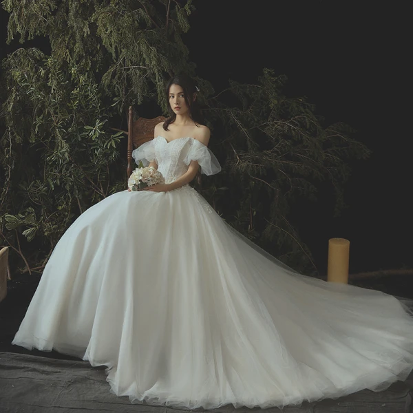 Eleganta Elfenben Korsett Bröllopsklänningar 2019 Prinsessa Spets Appliqués Beading Kristall Av Axeln Halterneck Ärmlös Chapel Train