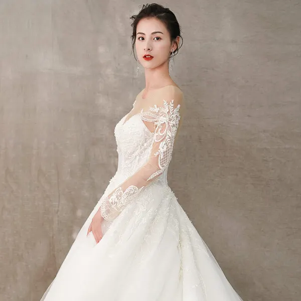 Élégant Ivoire Robe De Mariée 2019 Princesse Encolure Dégagée En Dentelle Fleur Manches Longues Dos Nu Cathedral Train