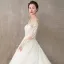 Élégant Ivoire Robe De Mariée 2019 Princesse Encolure Dégagée En Dentelle Fleur Manches Longues Dos Nu Cathedral Train