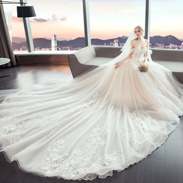 Chic / Belle Champagne Robe De Mariée 2019 Princesse Bustier Perlage En Dentelle Fleur Sans Manches Dos Nu Noeud Royal Train