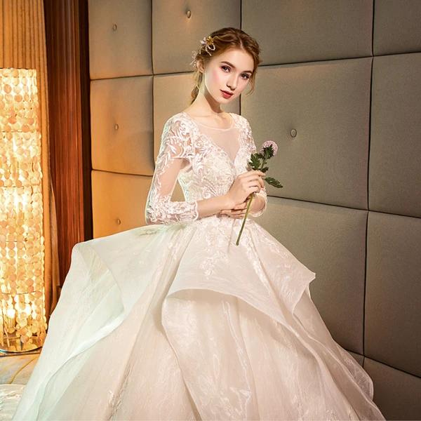 Audrey Hepburn Style Champagne Wedding Dresses 2019 Ball Gown See-through Scoop Neck Lace Appliques 3/4 Sleeve Backless Cascading Ruffles Royal Train