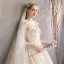 Elegante Champagne Trouwjurken 2019 A lijn Ronde Hals Appliques Kant Bloem Pailletten 3/4 Mouwen Ruglooze Royal Train