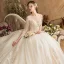 Luxe Champagne Robe De Mariée 2019 Robe Boule Encolure Dégagée Perlage Cristal Gland Paillettes En Dentelle Fleur 3/4 Manches Dos Nu Royal Train