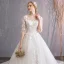 Élégant Ivoire Robe De Mariée 2019 Princesse Encolure Dégagée Appliques En Dentelle Fleur Perle 3/4 Manches Dos Nu Cathedral Train