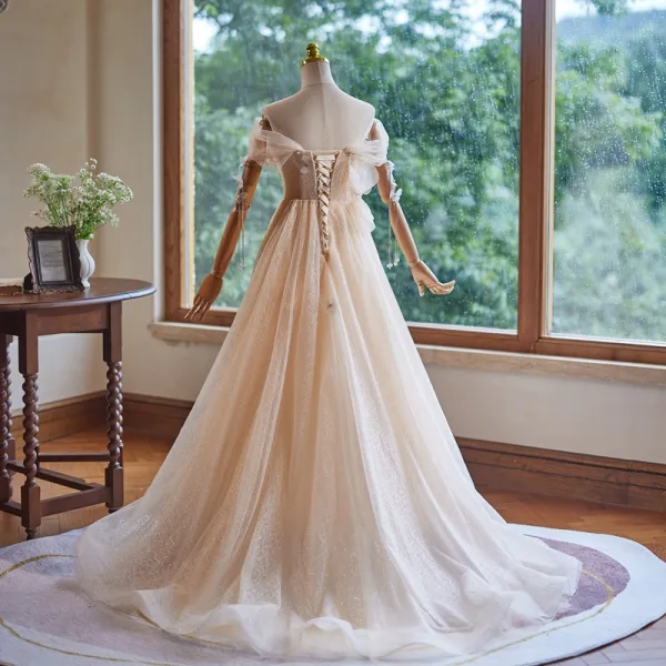 Chic / Beautiful Champagne Glitter Pearl Prom Dresses 2024 Ball Gown Off-The-Shoulder Short Sleeve Backless Floor-Length / Long Prom Formal Dresses