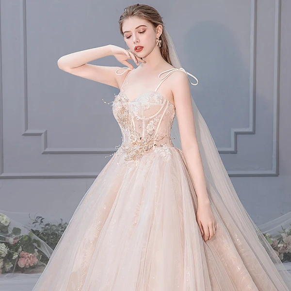 Elegant Champagne Wedding Dresses 2019 Ball Gown Spaghetti Straps Bow Beading Rhinestone Pearl Lace Flower Appliques Sleeveless Backless Royal Train