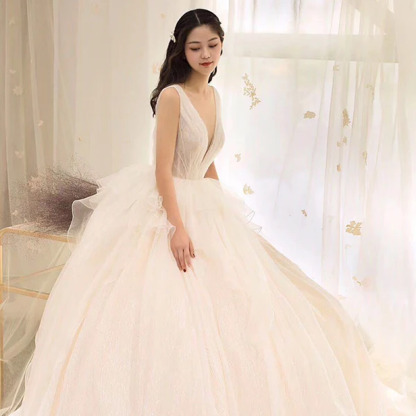 Luxury / Gorgeous Champagne Wedding Dresses 2019 A-Line / Princess V-Neck Glitter Tulle Cascading Ruffles Sleeveless Backless Cathedral Train