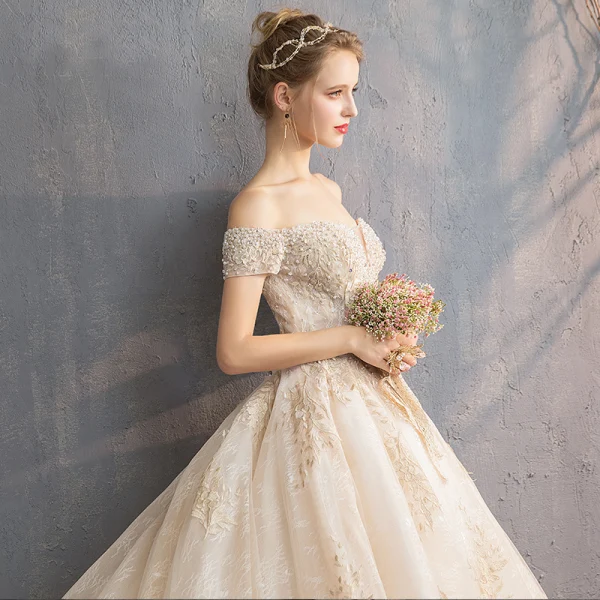 Audrey Hepburn Style Champagne Wedding Dresses 2019 A-Line / Princess Off-The-Shoulder Beading Pearl Lace Flower Short Sleeve Backless Cathedral Train