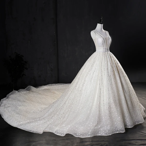 Meilleur Ivoire Fait main Perlage Robe De Mariée 2019 Princesse V-Cou Glitter Tulle Sans Manches Dos Nu Cathedral Train