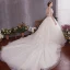 Charmant Ivoire Robe De Mariée 2019 Princesse Encolure Dégagée Perlage Appliques Manches Courtes Dos Nu Cathedral Train