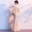 Charming Champagne Evening Dresses  2019 Trumpet / Mermaid V-Neck Sequins Bell sleeves Backless Floor-Length / Long Formal Dresses