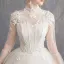 Élégant Champagne Robe De Mariée 2019 Princesse Col Haut Appliques En Dentelle Fleur Perlage Perle Paillettes Manches Longues Dos Nu Longue