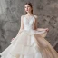 Charming Champagne Wedding Dresses 2019 Ball Gown V-Neck Pearl Sleeveless Backless Cascading Ruffles Cathedral Train
