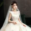 Audrey Hepburn Style Champagne Wedding Dresses 2019 A-Line / Princess Ruffle Scoop Neck Beading Lace Flower Sleeveless Backless Floor-Length / Long