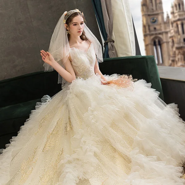 Fabulous Champagne Wedding Dresses 2019 Ball Gown Spaghetti Straps Ruffle Lace Flower Sequins Sleeveless Backless Royal Train