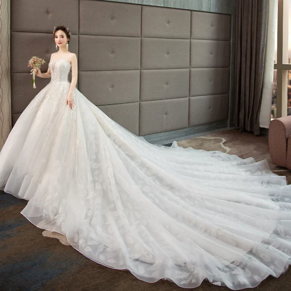 Edles Ivory / Creme Brautkleider / Hochzeitskleider 2019 A Linie Perlenstickerei Perle Pailletten Spitze Blumen Ärmellos Rückenfreies Königliche Schleppe