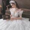 Modern / Fashion Ivory Cascading Ruffles Wedding Dresses 2021 Ball Gown High Neck Rhinestone Sequins Lace Flower Short Sleeve Backless Royal Train Wedding