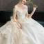 Luxury / Gorgeous Champagne Wedding Dresses 2019 Ball Gown Off-The-Shoulder Beading Pearl Crystal Tassel Lace Flower Short Sleeve Backless Cascading Ruffles Cathedral Train