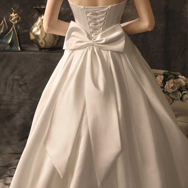 Sjarmerende Elfenben Brudekjoler 2019 Prinsesse Strapless Uten Ermer Ryggløse Sløyfe Chapel Train