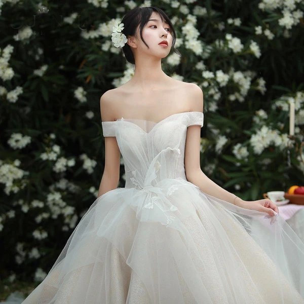 High-end Champagne Wedding Dresses 2019 Ball Gown Off-The-Shoulder Lace Flower Sleeveless Backless Royal Train
