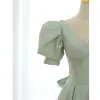Piękne Szałwia Zielony Homecoming Satyna Sukienki Na Studniówke 2021 Princessa V-Szyja Kótkie Rękawy Bez Pleców Kokarda Długość Herbaty Sukienki Wizytowe