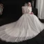 Élégant Ivoire Robe De Mariée 2019 Princesse Encolure Dégagée Perlage Paillettes En Dentelle Fleur Manches Courtes Dos Nu Cathedral Train