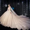 Luxury / Gorgeous Champagne Wedding Dresses 2020 Ball Gown Scoop Neck Beading Crystal Glitter Sequins Long Sleeve Backless Royal Train