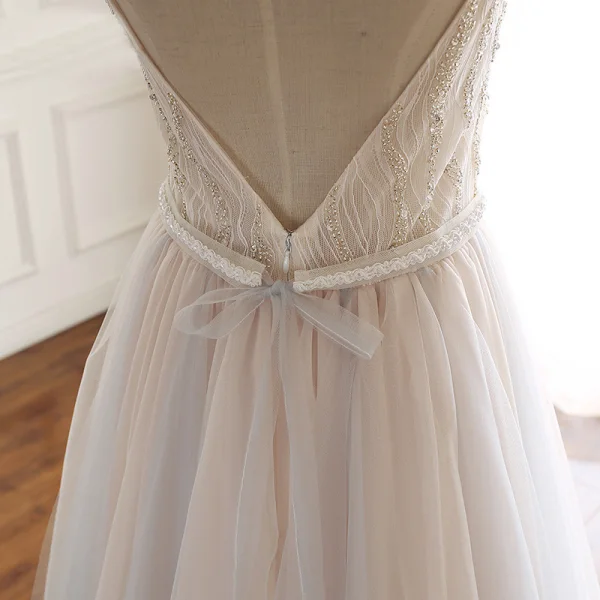 Luxe Beige Robe De Soirée 2020 Princesse Bretelles Spaghetti Perlage En Dentelle Fleur Paillettes Sans Manches Dos Nu Noeud Longue Robe De Ceremonie