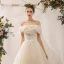 Élégant Champagne Robe De Mariée 2020 Princesse De l'épaule Noeud En Dentelle Fleur Appliques Manches Courtes Dos Nu Cathedral Train