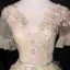 Élégant Conte de fée Champagne Robe De Bal 2020 Robe Boule Encolure Dégagée Faux Diamant En Dentelle Fleur Appliques Manches Courtes Dos Nu Longue Robe De Ceremonie