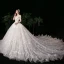 Haut de Gamme Ivoire Robe De Mariée 2020 Robe Boule Encolure Dégagée Perlage Faux Diamant En Dentelle Fleur Manches Longues Dos Nu Royal Train