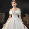 Modest / Simple Elegant Ivory Satin Wedding Dresses 2021 Ball Gown Off-The-Shoulder Bow Short Sleeve Backless Cathedral Train Wedding