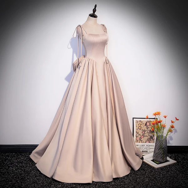 Elegante Champagner Satin Ballkleider 2022 A Linie Spaghettiträger Perlenstickerei Perle Ärmellos Rückenfreies Schleife Lange Festliche Kleider