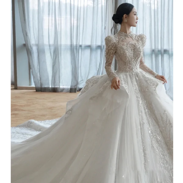 High-end White Cascading Ruffles Beading Pearl Rhinestone Sequins Wedding Dresses 2022 Ball Gown Scoop Neck Long Sleeve Backless Royal Train Wedding