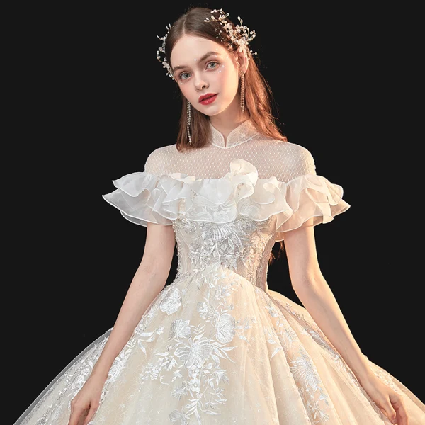 Illusion Champagne Lace Flower Sequins Wedding Dresses 2021 Ball Gown High Neck Ruffle Short Sleeve Backless Cathedral Train Wedding