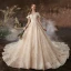 Charmant Champagne Robe De Mariée 2020 Princesse Encolure Dégagée Perlage Paillettes En Dentelle Fleur Manches Courtes Dos Nu Cathedral Train