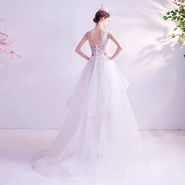 Abordable Blanche Robe De Mariée 2020 Princesse V-Cou En Dentelle Fleur Sans Manches Dos Nu Volants en Cascade Train De Balayage