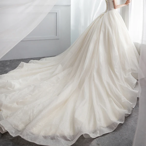 Sparkly Ivory Wedding Dresses 2018 Ball Gown Off-The-Shoulder Backless Sleeveless Cathedral Train Wedding