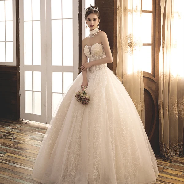 Élégant Champagne Robe De Mariée 2018 Robe Boule Perlage Perle Faux Diamant Paillettes Bustier Dos Nu Sans Manches Longue Mariage