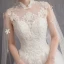 Charming White Wedding Dresses 2018 Ball Gown Lace Appliques Beading Crystal Pearl High Neck Sleeveless Backless Watteau Train Wedding