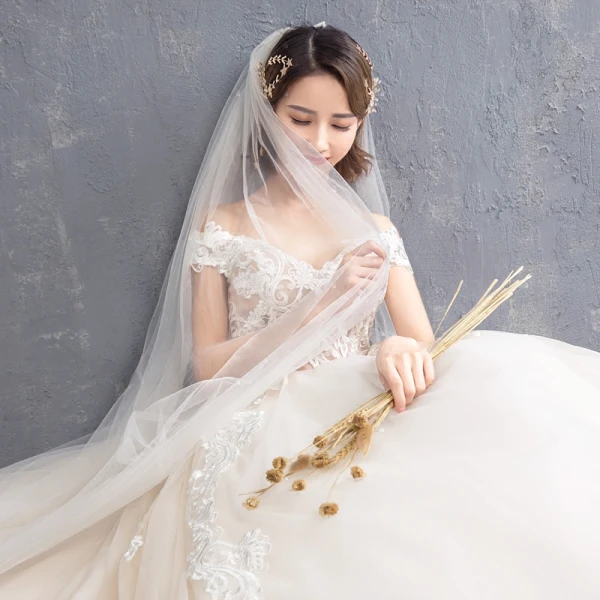 Elegant Champagne Wedding Dresses 2018 Ball Gown Appliques Lace Off-The-Shoulder Backless Sleeveless Chapel Train Wedding