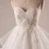 Chic / Beautiful Plus Size Ivory Wedding Dresses A-Line / Princess Strapless 2018 Crossed Straps Appliques Backless Beading Tulle
