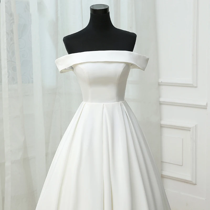 Modest Simple White Wedding 2017 A Line Princess Strapless Crossed Straps Striped Backless Strappy Court Train Wedding Dresses Modest Simple White Wedding 2017 A Line Princess Strapless Crossed Straps Striped Backless Strappy Court Train Wedding Dresses