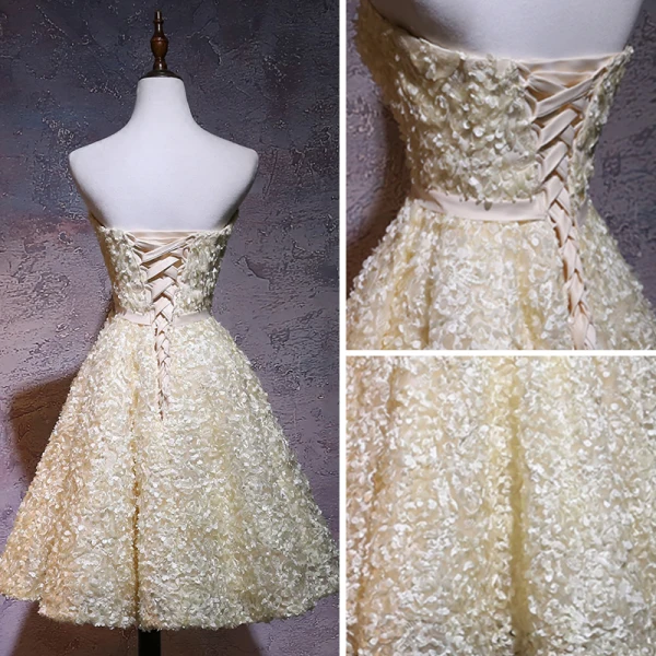 Fine Champagne Homecoming Graduation Kjoler 2018 Prinsesse Kjæreste Uten Ermer Appliques Blomst Sløyfe Sash Knelengde Buste Ryggløse Formelle Kjoler