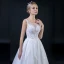 Erschwinglich Ivory / Creme Durchsichtige Brautkleider 2018 A Linie Rundhalsausschnitt Ärmellos Rückenfreies Applikationen Mit Spitze Perlenstickerei Rüschen Lange
