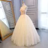 Illusion Champagne See-through Prom Dresses 2018 Ball Gown High Neck Sleeveless Appliques Flower Pearl Beading Floor-Length / Long Ruffle Backless Formal Dresses