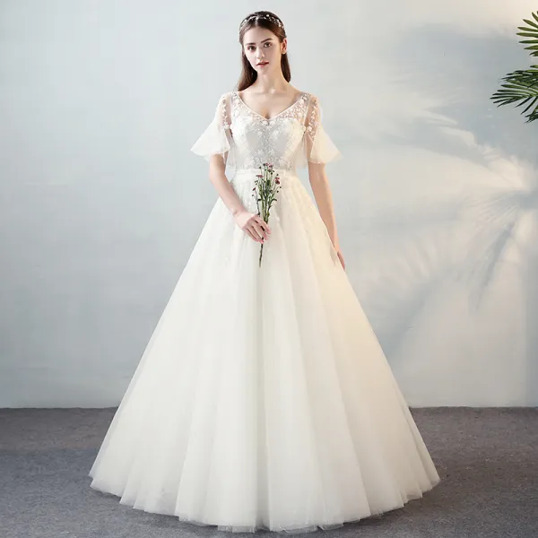 Modern / Fashion Ivory See-through Wedding Dresses 2018 A-Line / Princess V-Neck Short Sleeve Backless Beading Appliques Flower Bow Sash Ruffle Floor-Length / Long