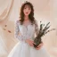 Chic / Belle Blanche Transparentes Robe De Mariée 2018 Robe Boule Encolure Dégagée Manches Longues Dos Nu Appliques En Dentelle Perle Volants Royal Train
